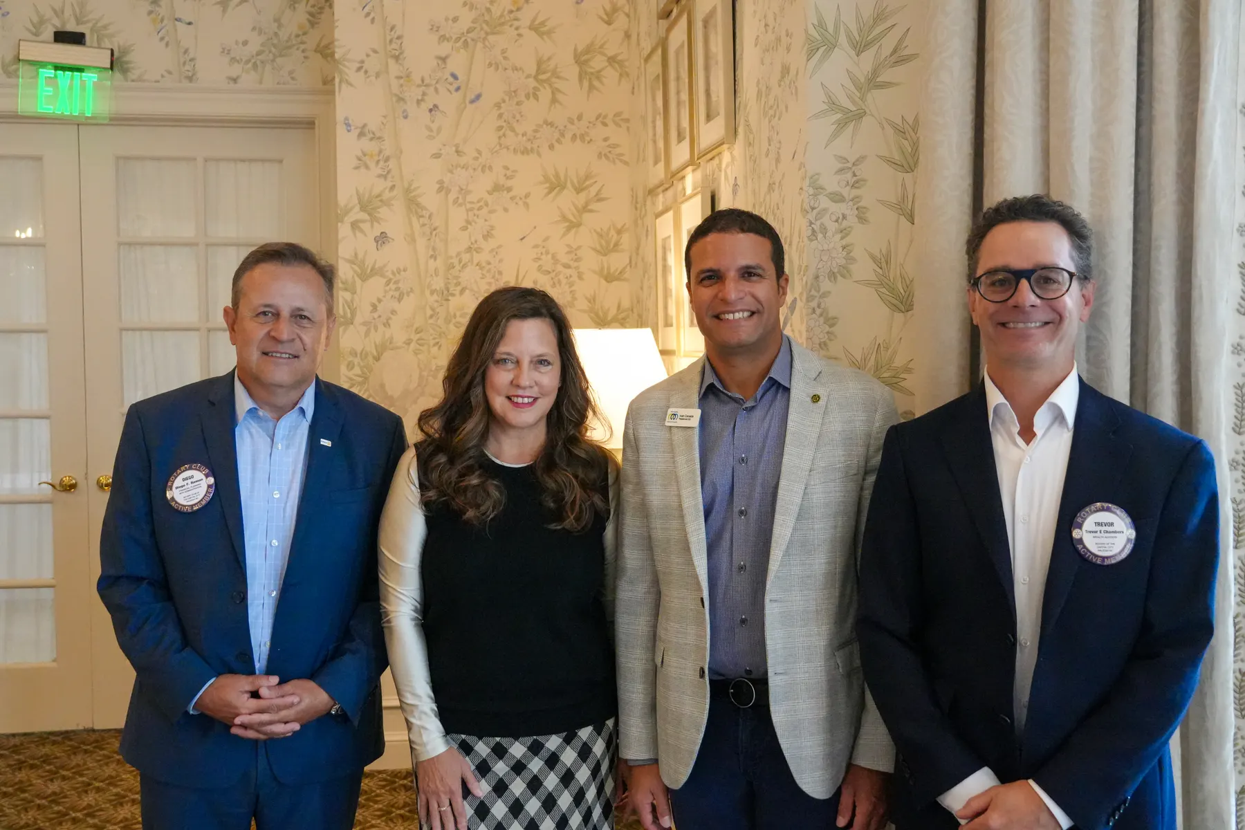Deigo Ramon, Club member; Kim Neustrom, Development Director of North Carolina Center for Nonprofits; Ivan Canada, President & CEO of North Carolina Center for Nonprofits; Trevor Chambers, Club President.