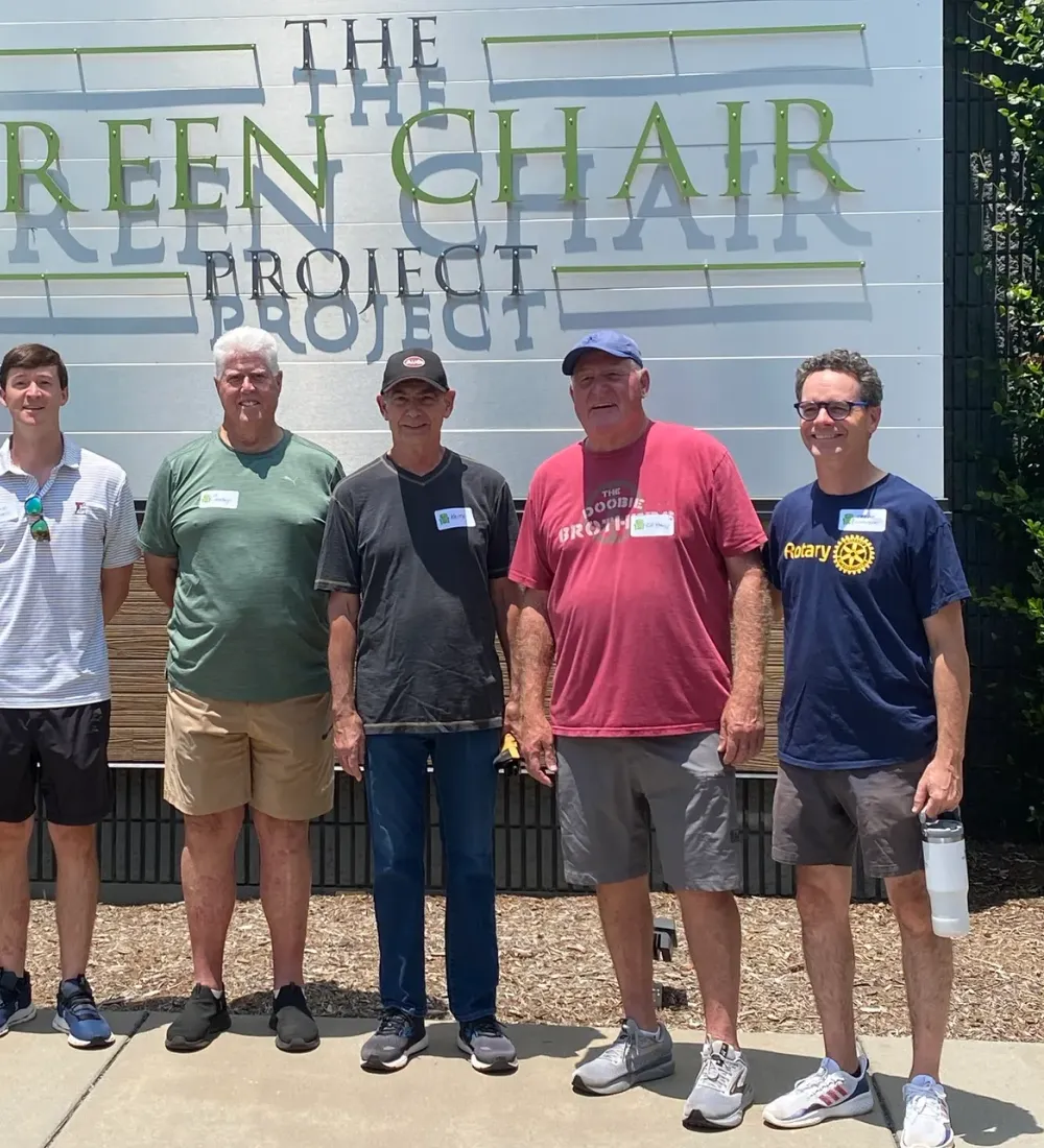 Rotary Club of the Capital City members volunteering at The Green Chair Project in Raleigh